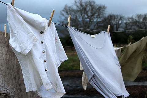 Linen Hanging On The Clothesline And Dried Stock Photo - Download Image Now  - Clothesline, Laundry, Clothing - iStock