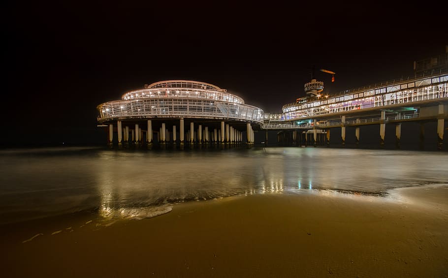 lighted pier near seashore, scheveningen, beach, sand, night HD wallpaper