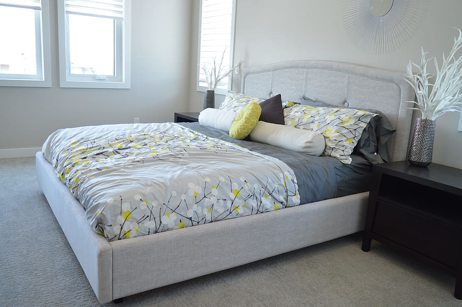 gray storage lift-up bed ; gray-green-black floral comforter with pillow HD wallpaper