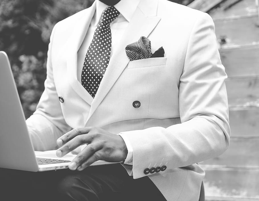 grayscale photo of man wearing white suit with laptop on lap, HD wallpaper