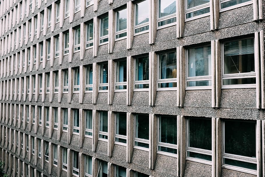 gray and white concrete building, gray concrete building with glass window HD wallpaper