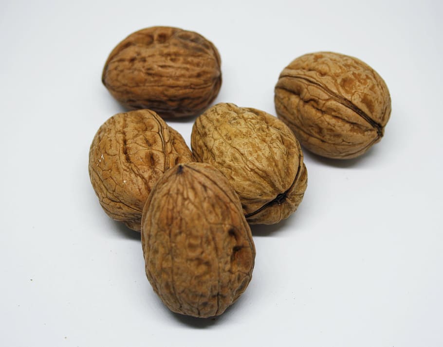 five brown walnuts, dried fruit, hazelnuts, almonds, shell HD wallpaper