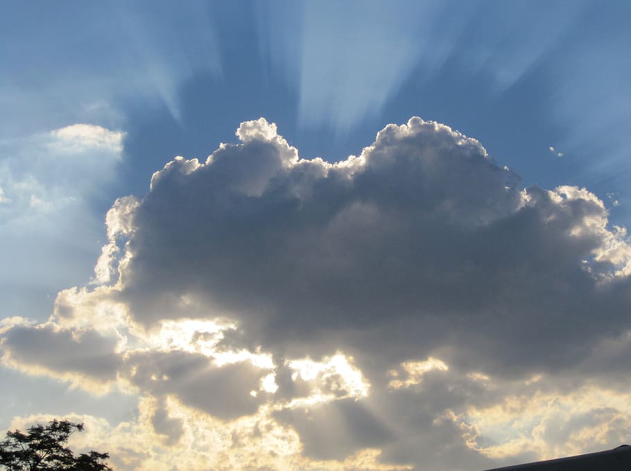 crepuscular on clouds, dark cloud, surrounded with light, light source behind