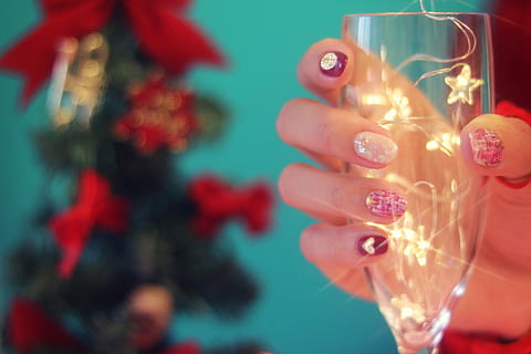 woman holding wine glass with string light, christmas, celebration HD wallpaper