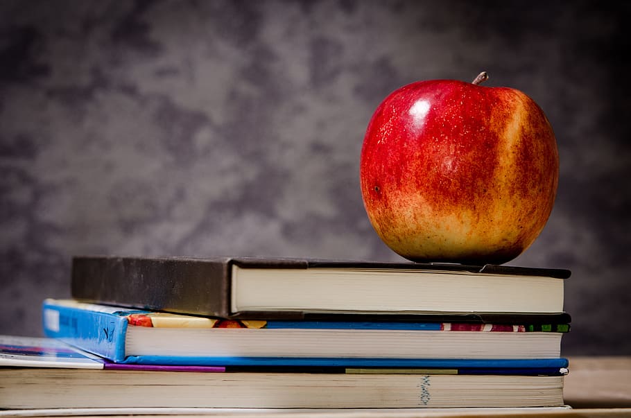 red apple on black book, education, school, knowledge, apples