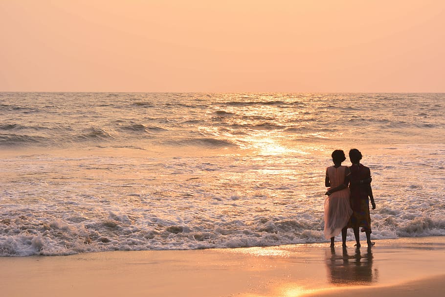 sisters love, two persons staring at body of water during sunset HD wallpaper