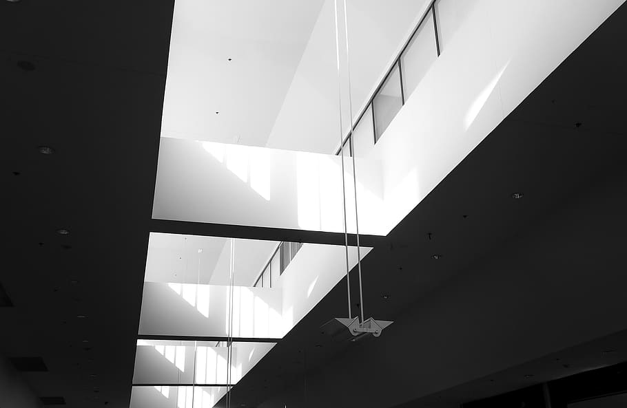 low angle photography of white painted room interior, white and gray building with light inside the room HD wallpaper