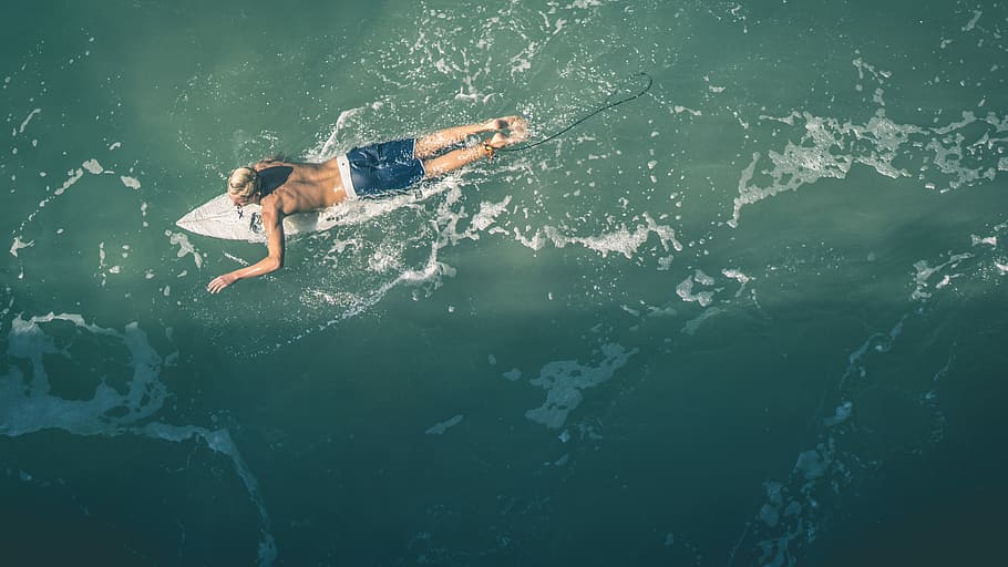 man in blue and white shorts surfboarding, sport, water Sport HD wallpaper