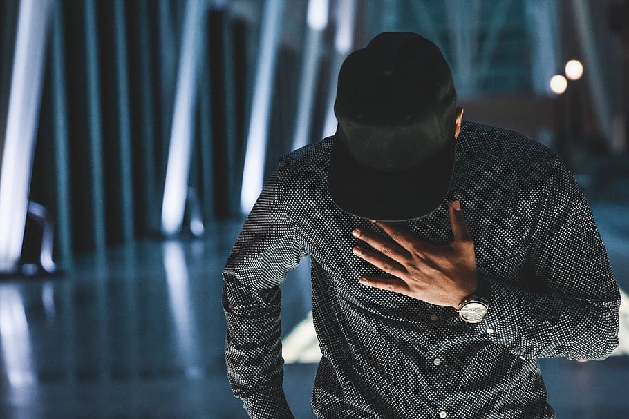 man wearing black dress shirt holding chest, people, guy, alone HD wallpaper