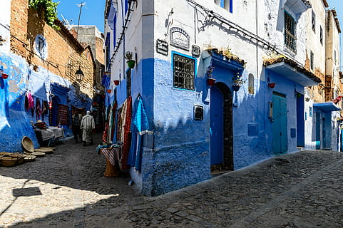 Chefchaouen, person walking between blue buildings, architecture HD wallpaper