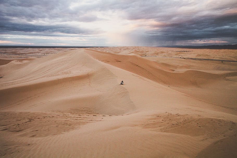 photo of desert, person between dessert during daytime, sand HD wallpaper