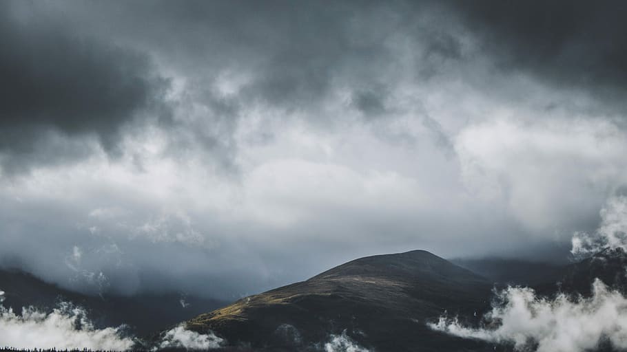 brown and black hill under cloudy sky during daytime, hill under cloudy sky HD wallpaper