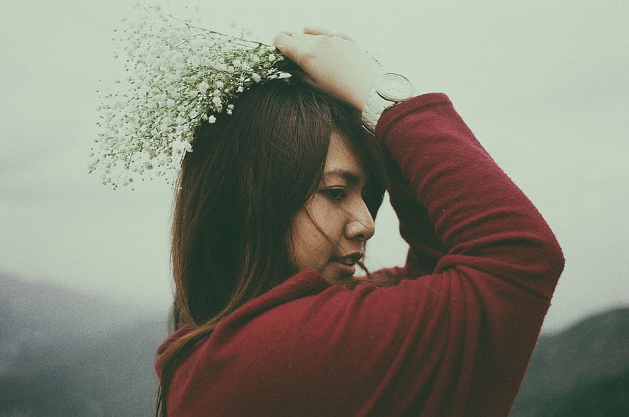 woman holding white flowers, red, sweater, petaled, head, focus, HD wallpaper