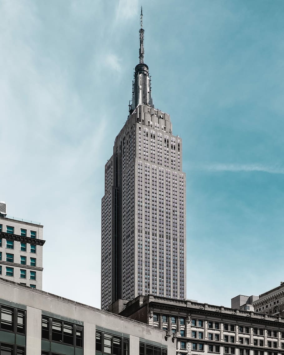 gray concrete building, low angle photography of building at daytime HD wallpaper