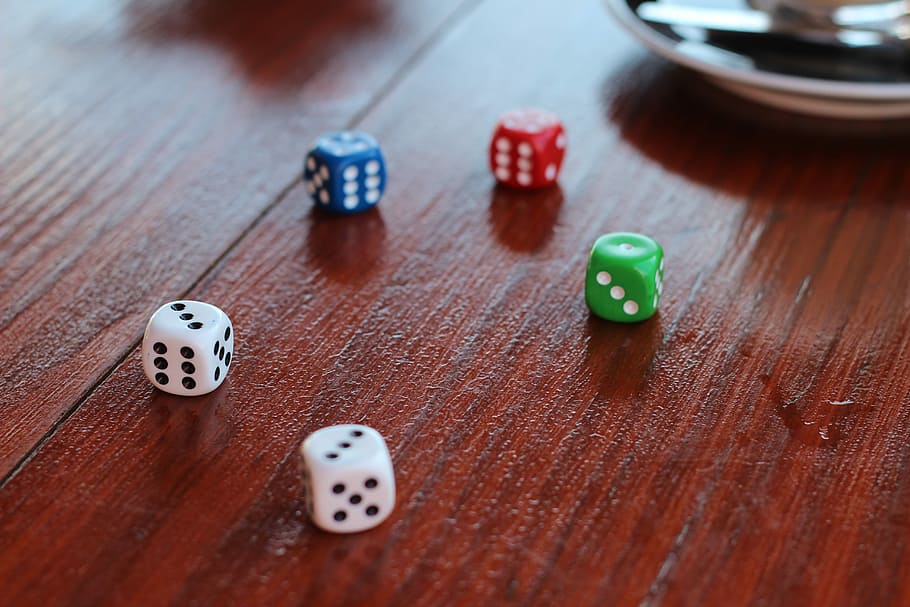 five assorted-color dice, several dices on wooden table, game HD wallpaper