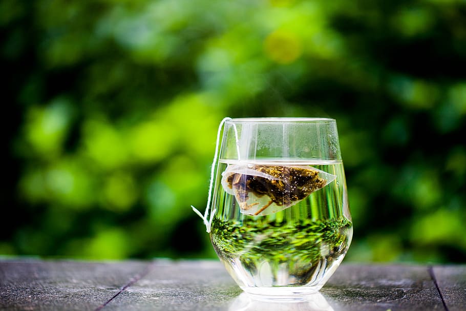 brown teabag in clear drinking glass, tea cup, green, tea bag, HD wallpaper