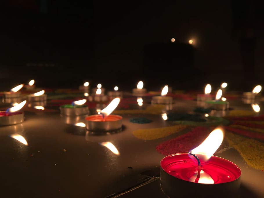 close-up photo of red lighted candles, flame, diwali, rangoli HD wallpaper