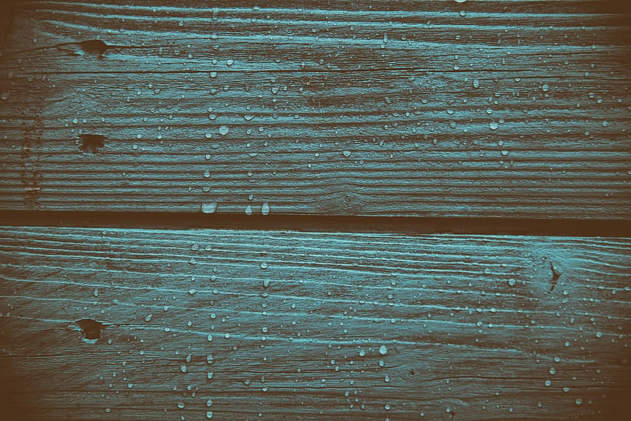 Closeup shot of coloured wood panels with fresh raindrops, image captured with a Canon DSLR HD wallpaper
