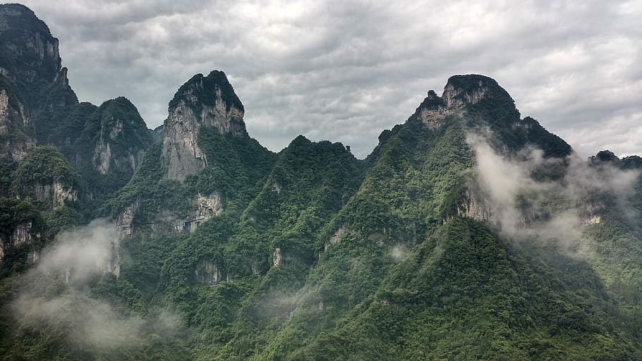 mountains with green trees during daytime, mountain range, rock HD wallpaper