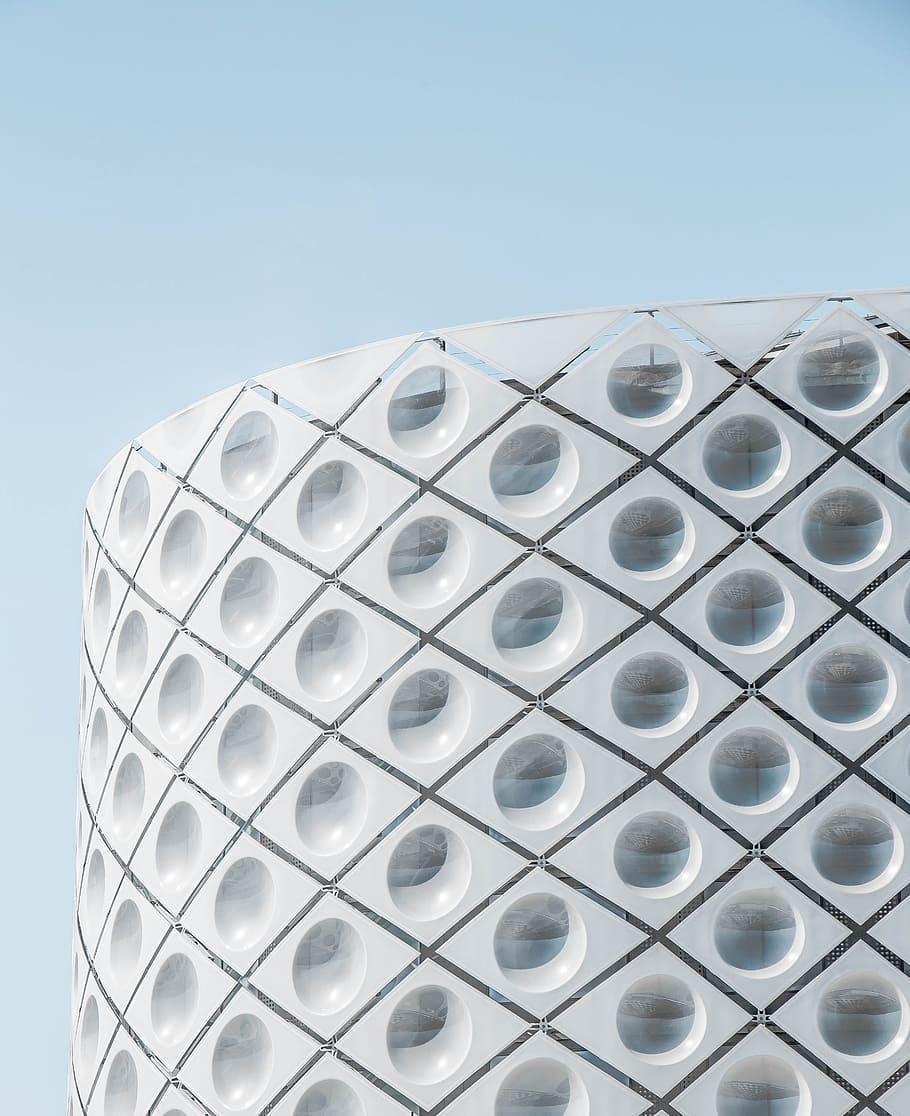 minimalist photography of high-rise building, closeup photo of round white building HD wallpaper