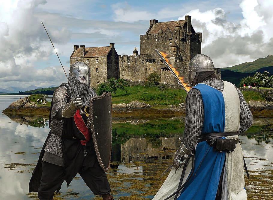 two men wearing armor with castle background, knights, medieval knights
