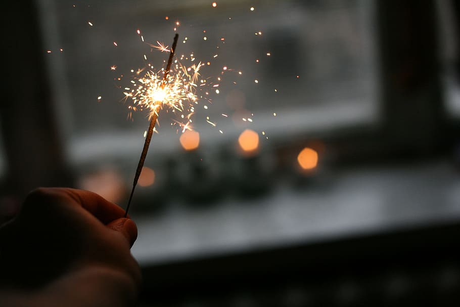 person holding sparkler, untitled, firecracker, light, fire - Natural Phenomenon HD wallpaper