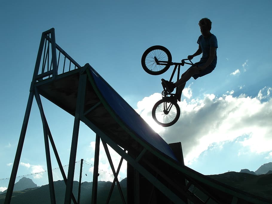 man riding BMX bike while making tricks, shadow, bicycle, jump HD wallpaper