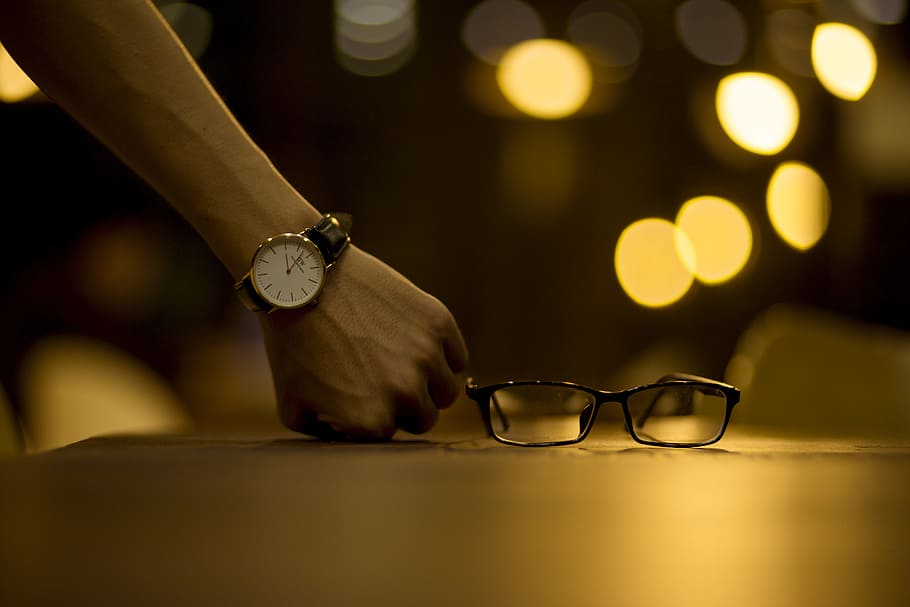 person resting fist beside eyeglasses, West, Bokeh, Clock, Dear HD wallpaper