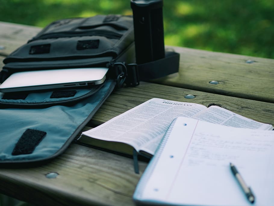 two books on wood plank, shallow focus photograph of notebooks and laptop HD wallpaper