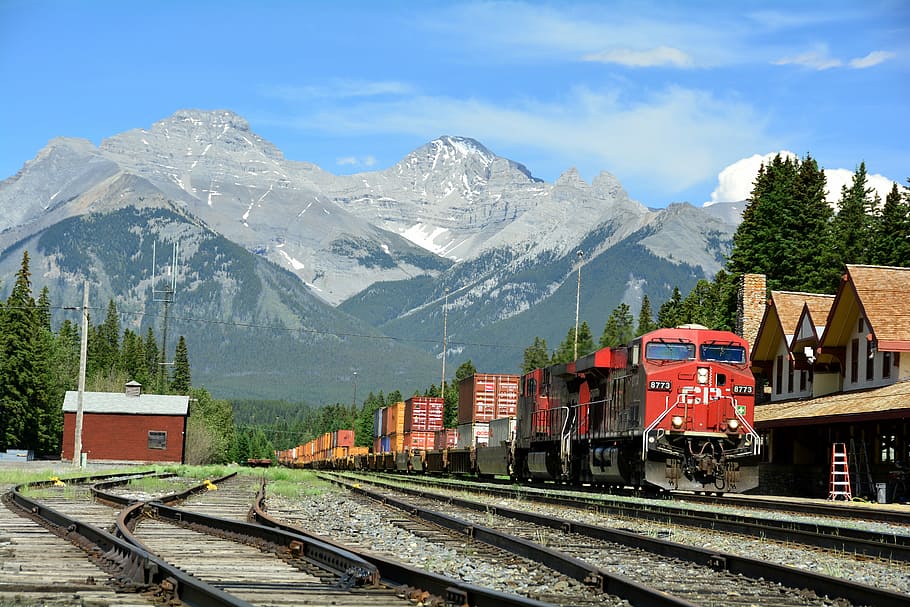 red train photo during daytime, Banff, Train Station, Depot, engine