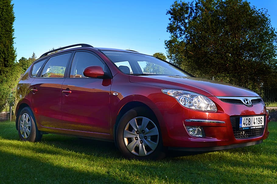auto, red, personal car, grass, sky, tree, mode of transportation HD wallpaper