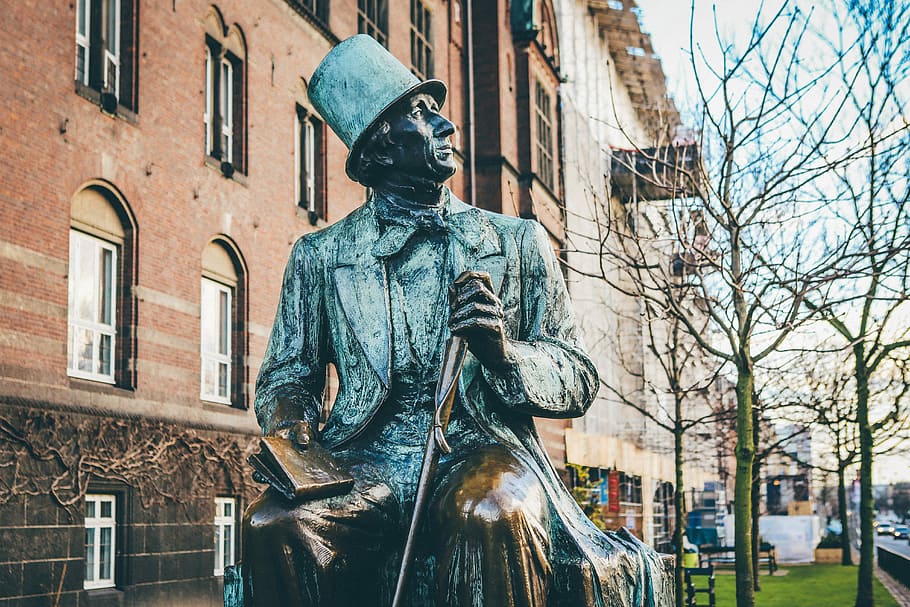 man in top hat and coat holding book and cane sitting statue, blue concrete man statue holding stick, HD wallpaper
