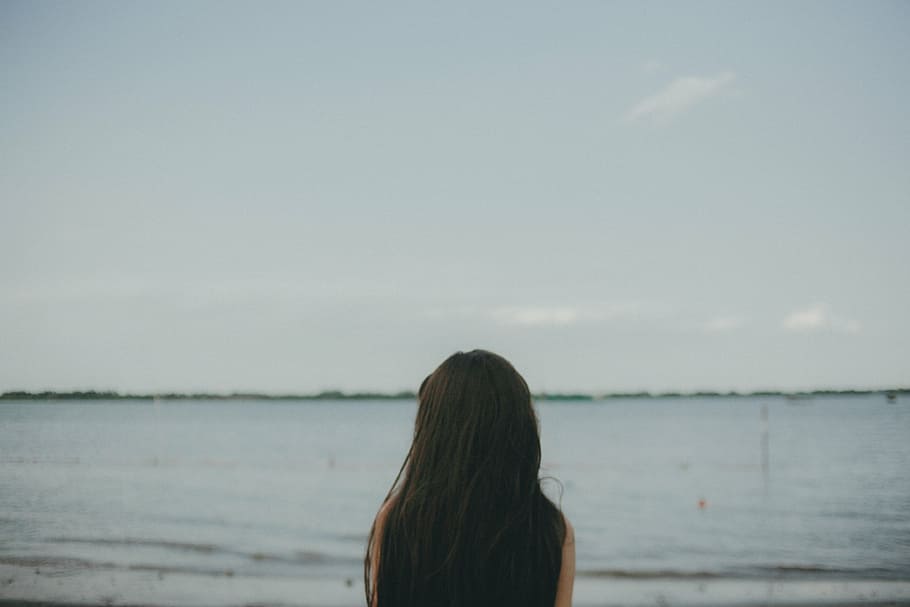 woman watching calm sea water during daytime, facing, body, girl, HD wallpaper