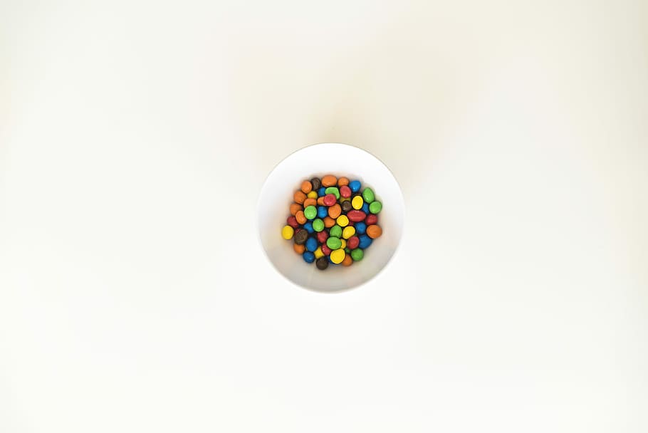 multicolored pebbles in white bowl, colorful candies in white bowl HD wallpaper