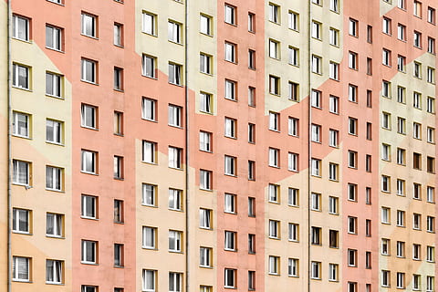 beige and brown city buildings, beige and orange concrete building HD wallpaper