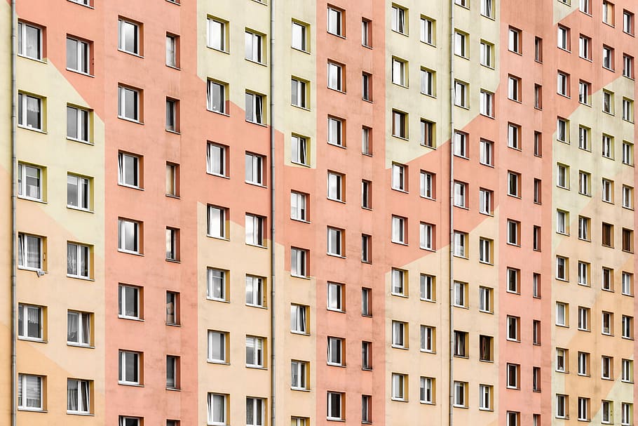 beige and brown city buildings, beige and orange concrete building HD wallpaper