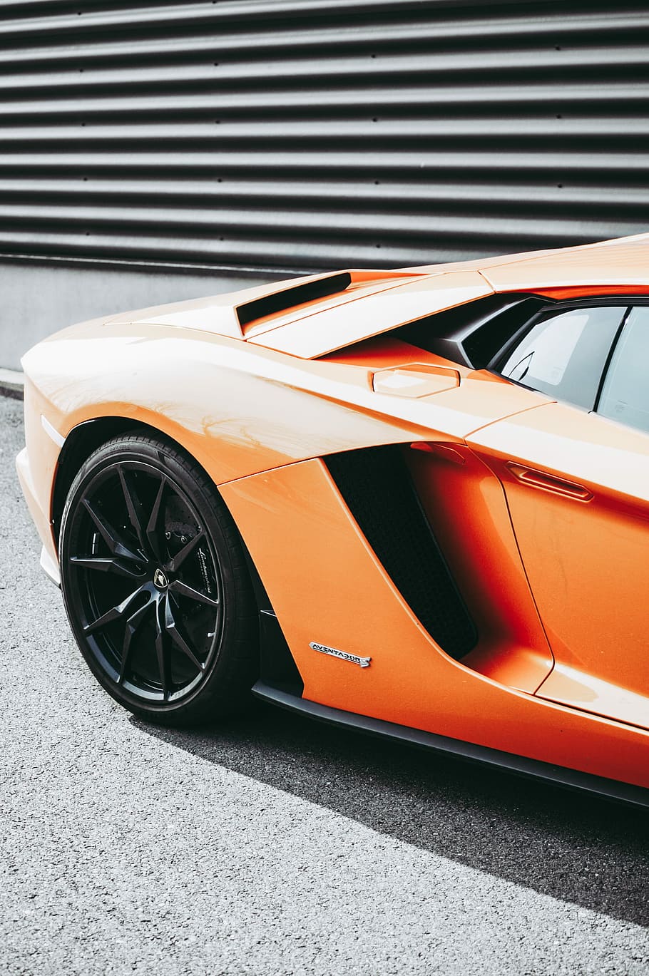 HD wallpaper: focus photography of parked orange sports car, orange Lamborghini  Aventador | Wallpaper Flare