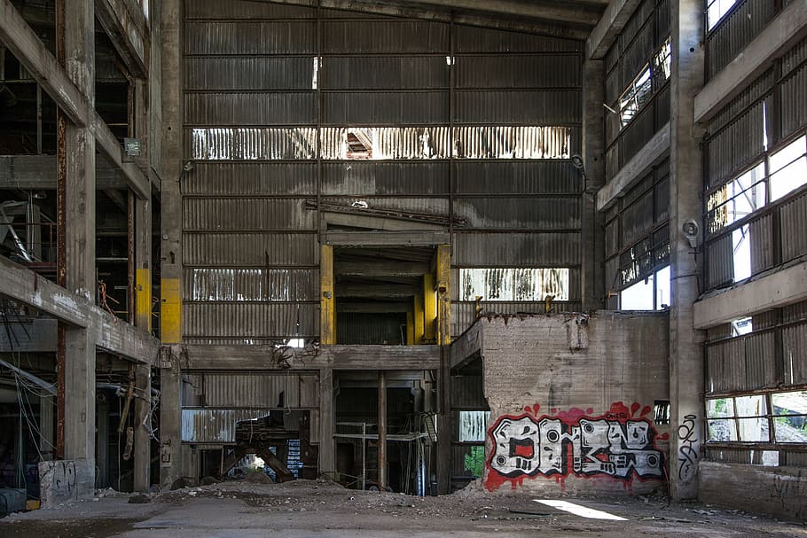 gray concrete building interior, graffiti, abandoned factory