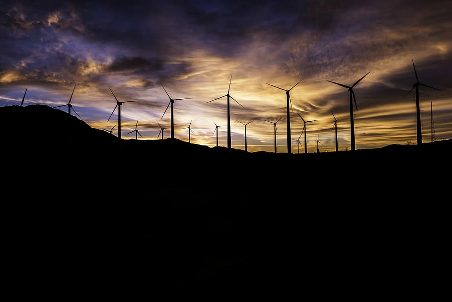 silhouette of windmills during golden hour, silhouette photo of windmills during sunset HD wallpaper