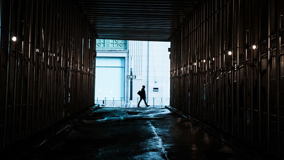 man walking beside white concrete building, people, alone, dark, HD wallpaper