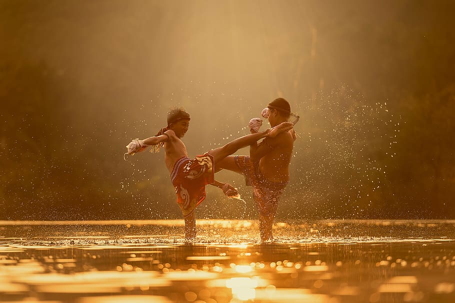 two boy playing in water during golden hour, children, fight HD wallpaper