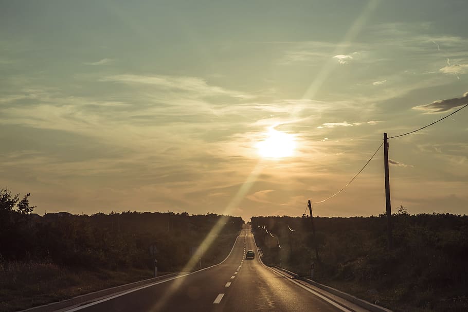 sunset, sky, clouds, rural, road, driving, highway, power lines HD wallpaper