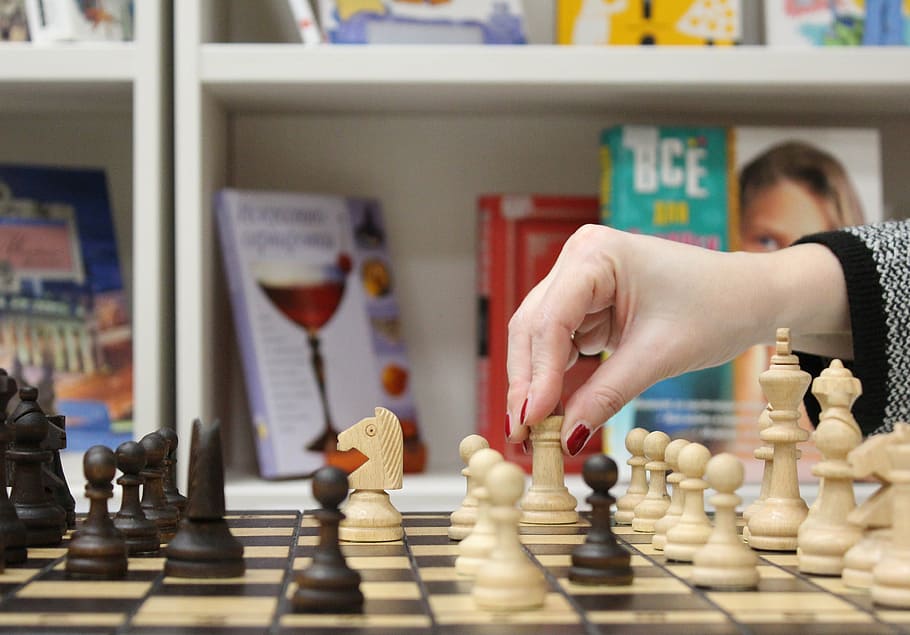 woman about to move chess rook, hand, figures, palm, pawn, championship HD wallpaper