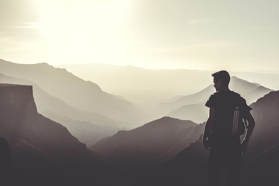 silhouette photo of man standing beside mountains, wearing, black, HD wallpaper