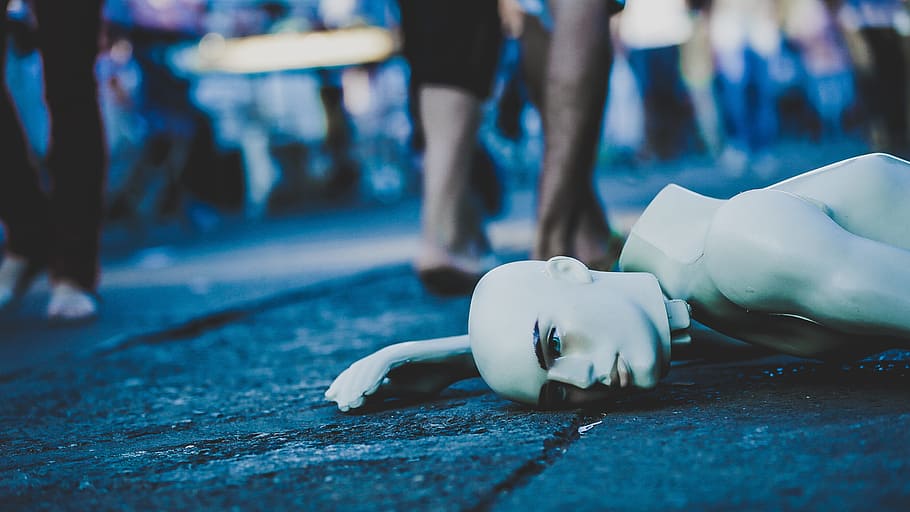 selective focus photography of male mannequin, lying down, street HD wallpaper