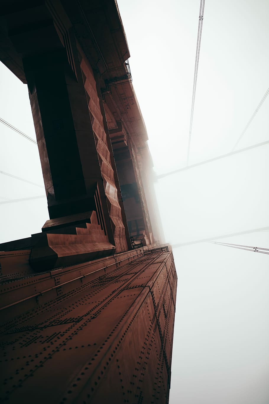 worms eye view on city buildings under white sky during daytime HD wallpaper