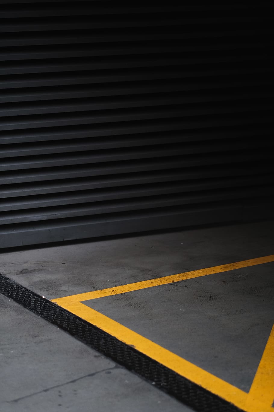 gray and yellow concrete flooring, grey roll-top gate, street HD wallpaper