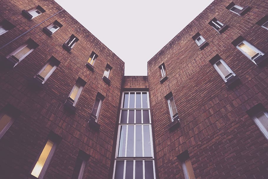 low-angle photography of brown concrete building, low angle photography of brown concrete building under white clouds HD wallpaper