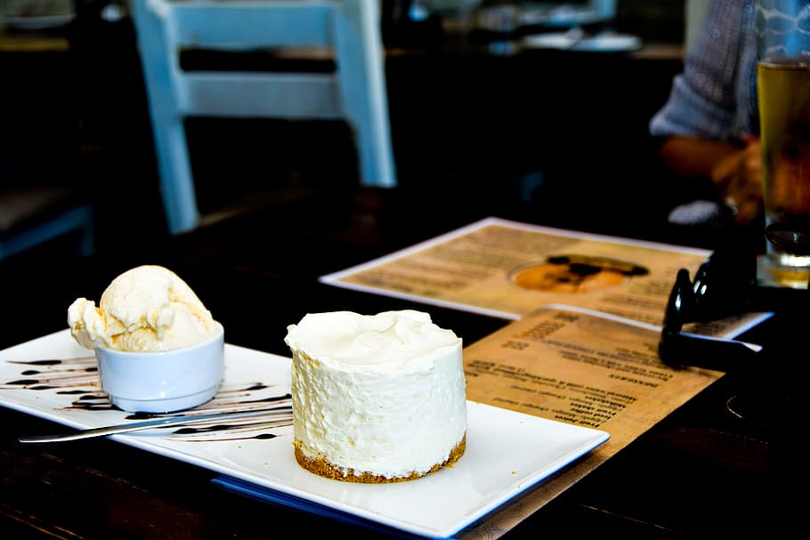Cheesecake on Plate, blur, chair, coffee, coffee shop, cream HD wallpaper