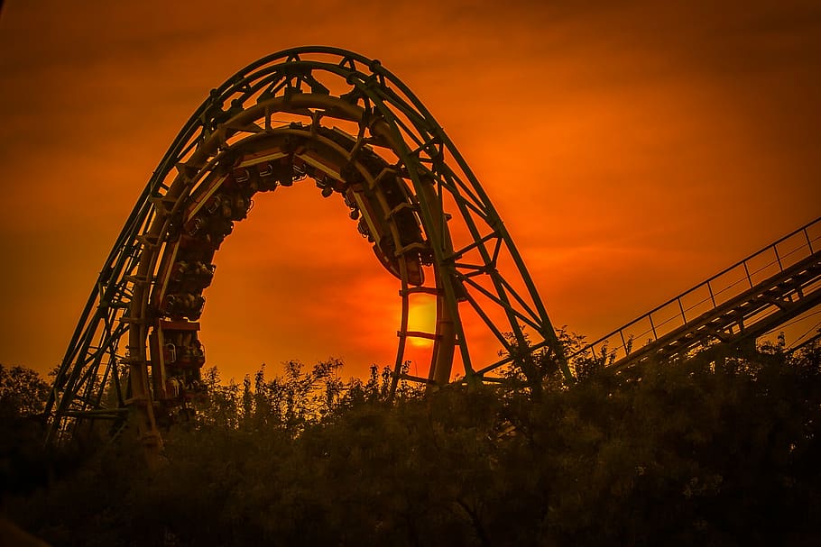 silhouette photography of round roller coaster rail with roller coaster during golden hour, HD wallpaper